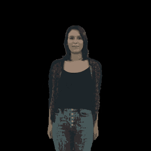 a woman in a black shirt and blue jeans is screaming