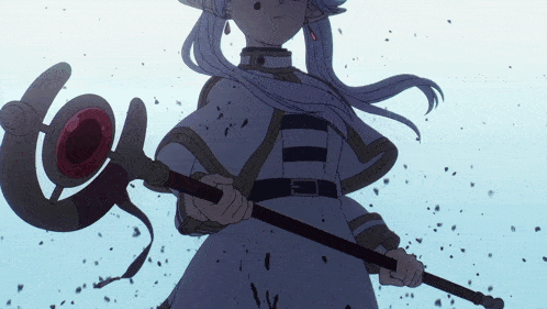 a girl in a white dress is holding a cane with a red circle on it