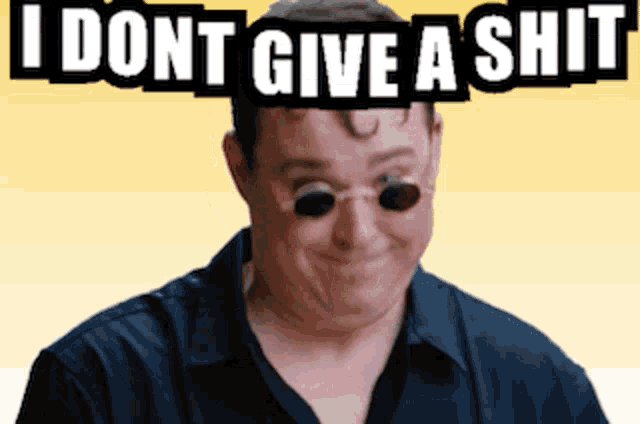 a man wearing sunglasses has the words i dont give a shit over his head