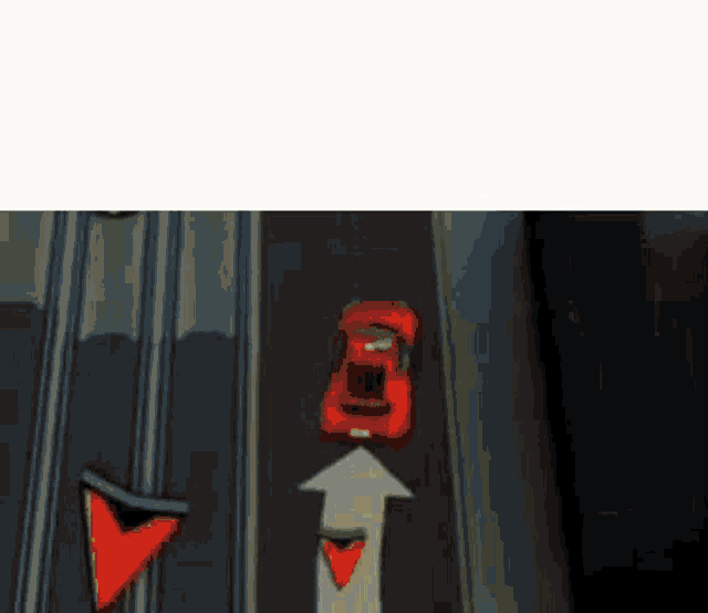 a red car is driving down a street in a video game