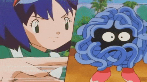 a girl with purple hair is standing next to a blue cartoon character with a black face .