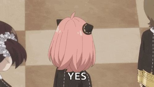 a cartoon girl with pink hair is covering her face with her hand and says yes .