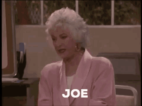 a woman in a pink suit is sitting in a hospital bed and says mama !