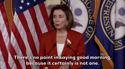 a woman stands in front of a house of representatives flag and says there 's no point in saying good morning