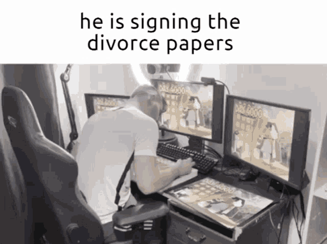 a man is sitting at a desk playing a video game with the words he is signing the divorce papers above him