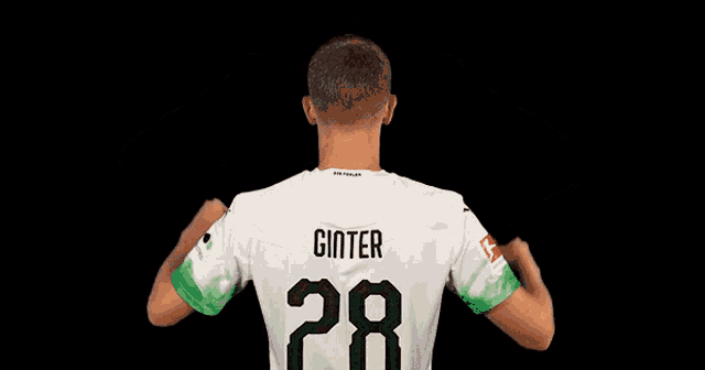 a soccer player with the number 28 on their jersey