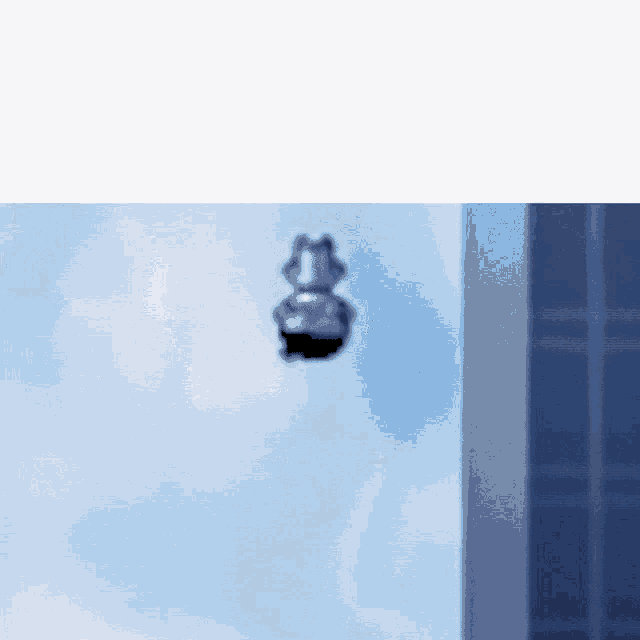 a blurred image of a person flying in the sky