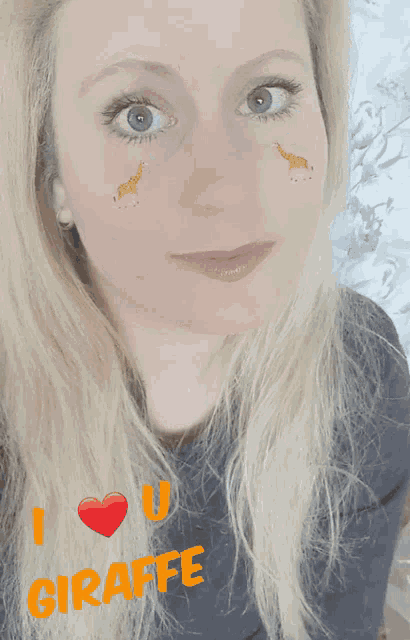 a woman with giraffes painted on her face and the words i love you giraffe
