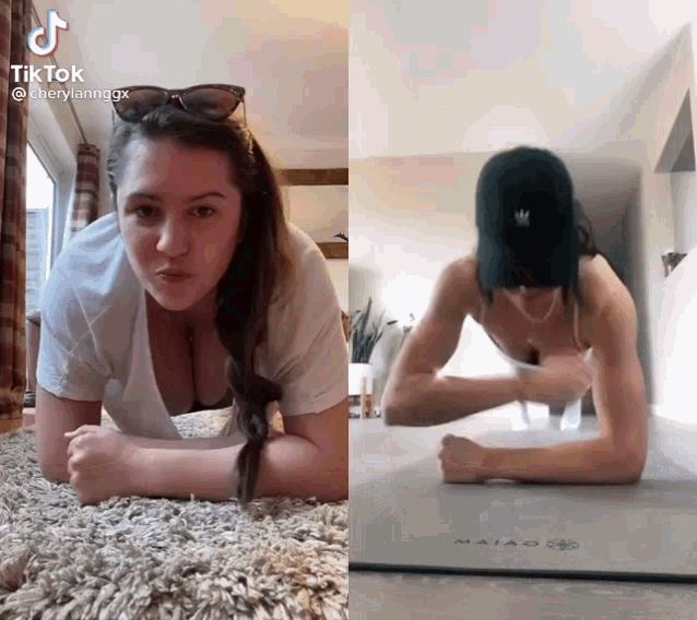 a woman is doing a plank on the floor next to another woman .