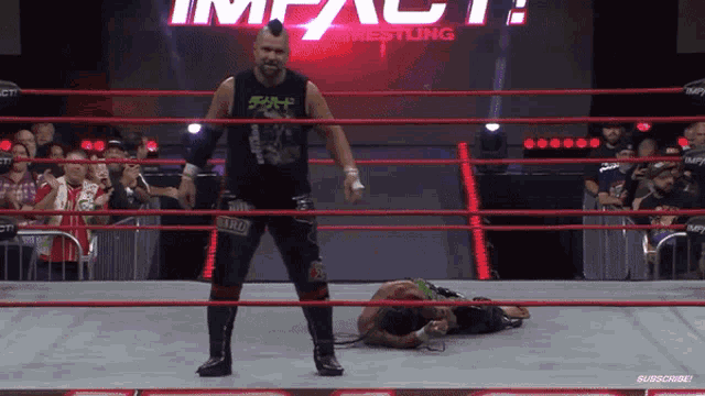 a wrestling ring with the word impact wrestling on it
