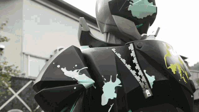 a statue of a robot with a zipper on its back