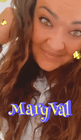 a close up of a woman 's face with the name mary val written on the bottom