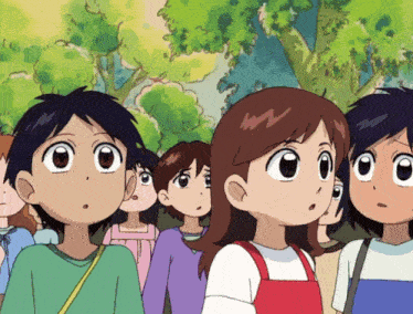 a group of kids are looking up at something