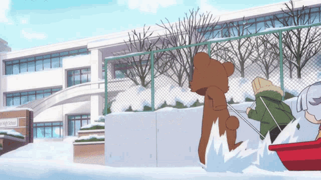 a bear is pulling a sled in front of a school