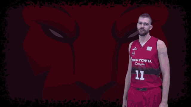 a basketball player with the number 11 on his uniform