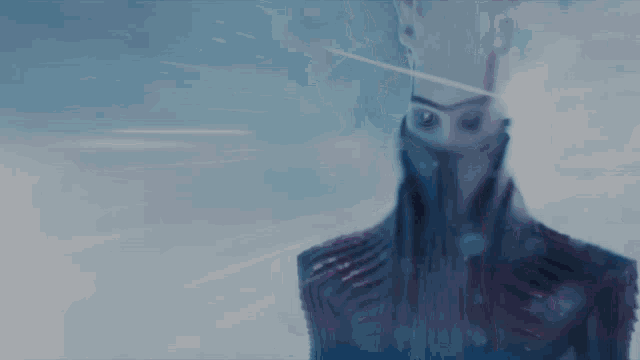 a close up of a person 's face with a blue background
