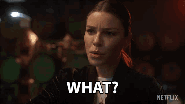 a woman in a black jacket says what in white letters