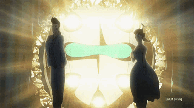 a man and a woman are standing in front of a mask that says adult swim on the bottom