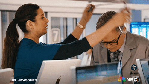 a nbc ad for chicagomed shows a doctor and a nurse having a conversation
