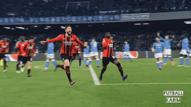 soccer players on a field with the word futball karim on the bottom