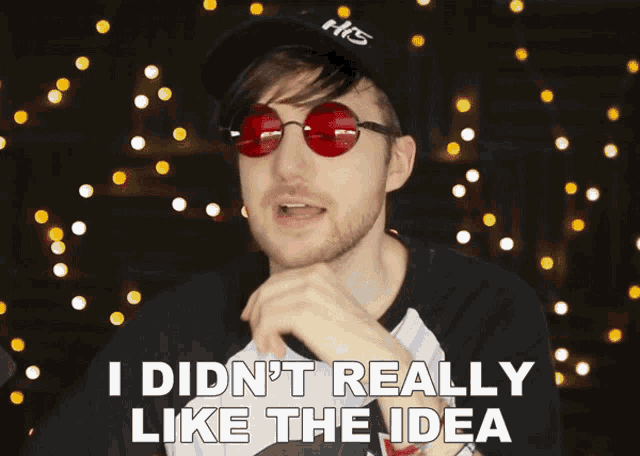 a man wearing sunglasses and a hat says i didn t really like the idea