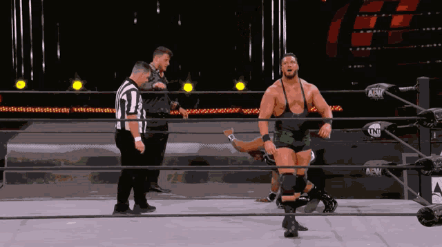 a man in a wrestling ring with the word tnt on the ring
