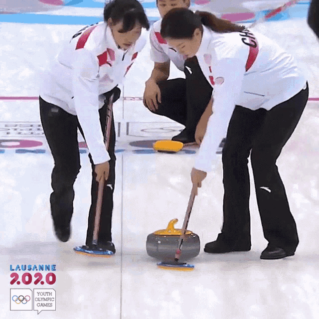 Curling Youth Olympic Games GIF - Curling Youth Olympic Games Sweeping GIFs