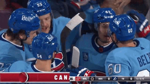 a hockey game is being played between canada and the lightning