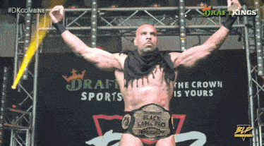 a man with a black label pro wrestling belt