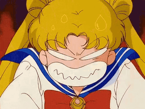 a close up of a cartoon character with a very angry look on her face .