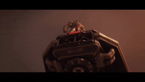 a statue of a robot with horns and a skull