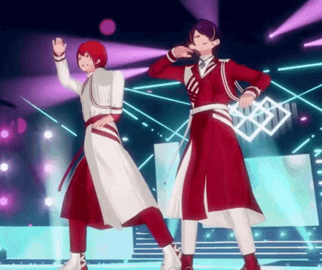 two anime characters are dancing on a stage in front of a microphone .