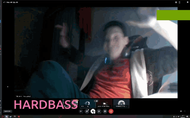 a computer screen shows a man in a red shirt and the words hardbass on the bottom