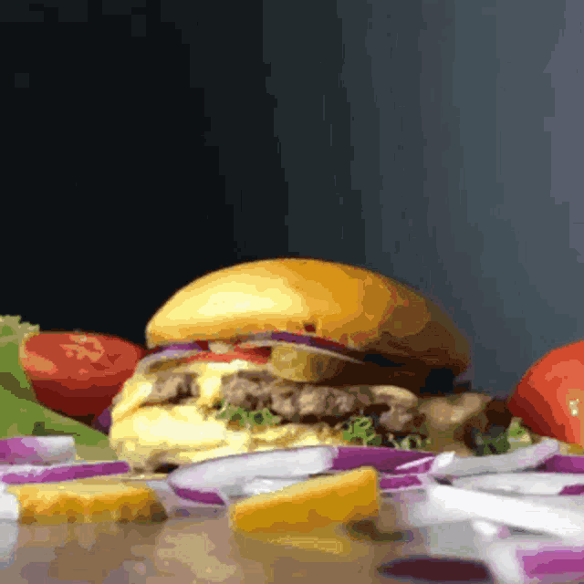 a close up of a hamburger on a table