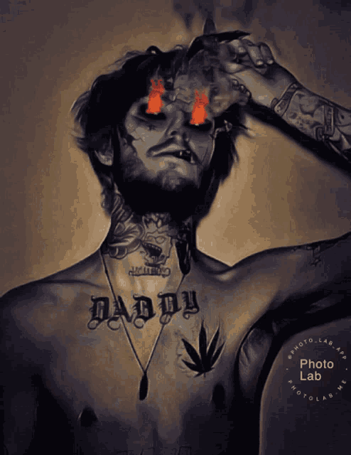 a man with daddy tattoo on his chest is smoking a cigarette