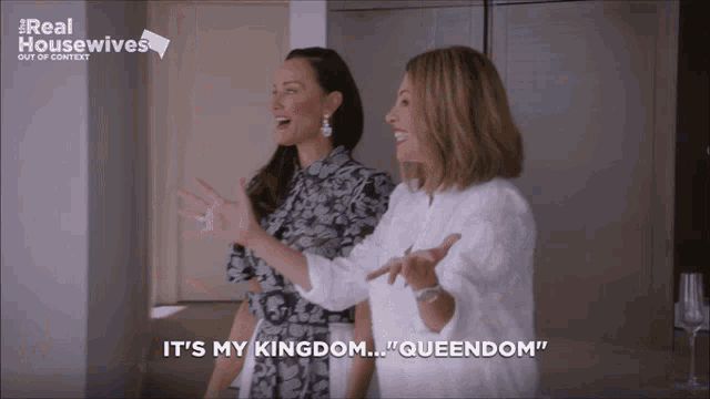 two women are standing next to each other and one says " it 's my kingdom queendom "