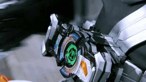 a close up of a futuristic device with a green circle in the middle