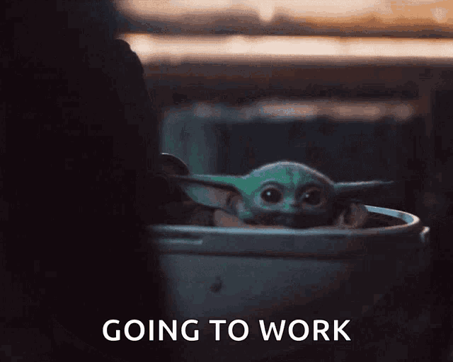 a baby yoda sitting in a bucket with the words going to work written below it