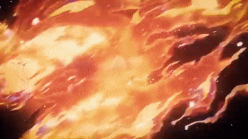 a bunch of fire is flying through the air in a dark room .