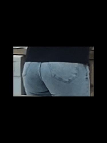 a woman 's butt is shown in a close up of her jeans