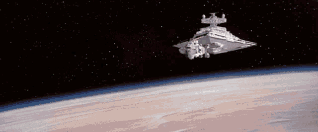 a space ship is flying over a planet