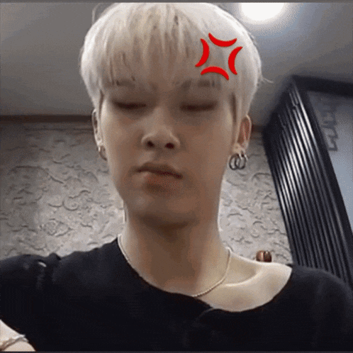 a man with a red star on his forehead
