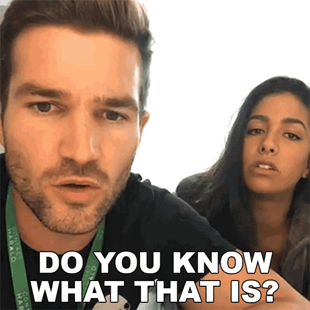a man and woman are standing next to each other and the man is asking the woman " do you know what that is "