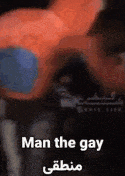 a close up of a person 's arm with the words man the gay written on it