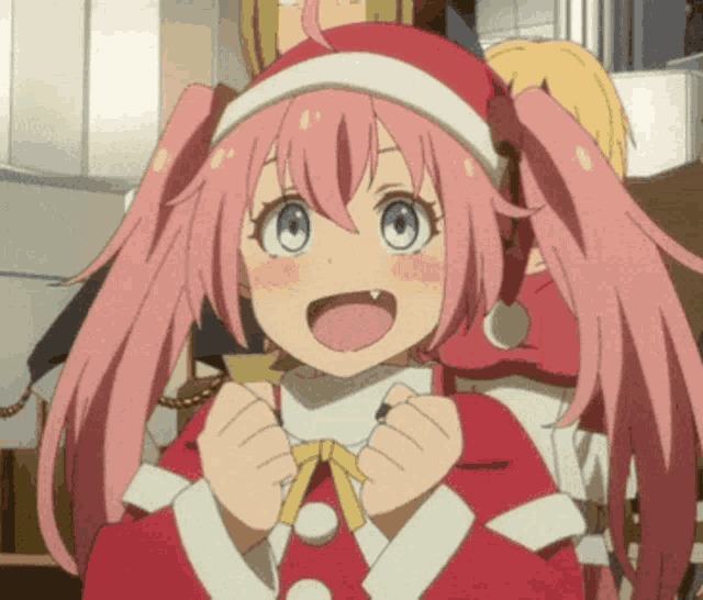 a girl with pink hair wearing a santa hat