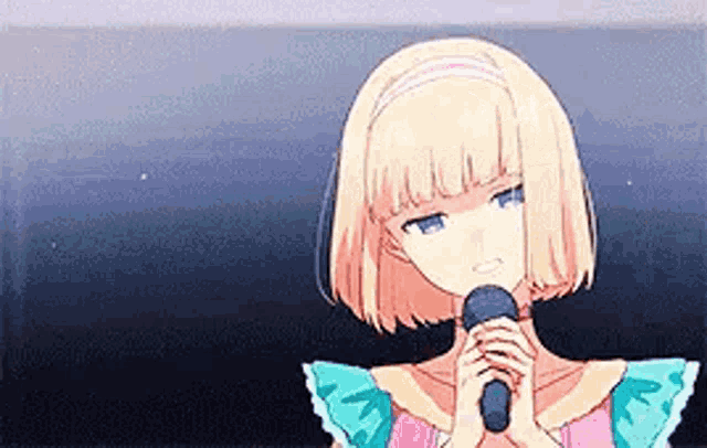 a blonde anime girl is holding a microphone in her hand .