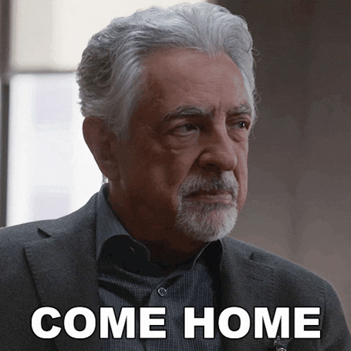 a man with gray hair and a beard has the words come home above his head