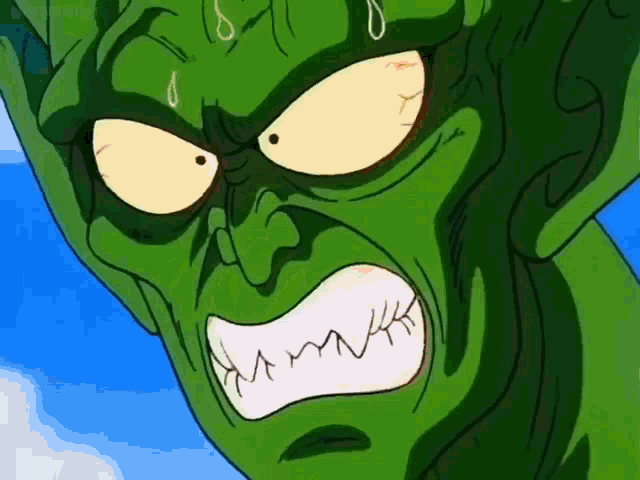 a close up of a cartoon character 's face with a very angry expression