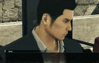 a close up of a man 's face with the name kiryu visible