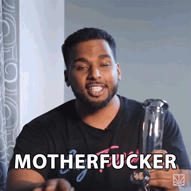 a man holding a bong says motherfucker in front of him